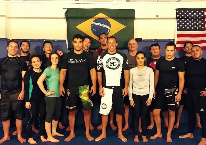 No-Gi BJJ class group photo at Caveirinha Jiu Jitsu Family in Santa Monica with Prof. Maycon Carvalho and students